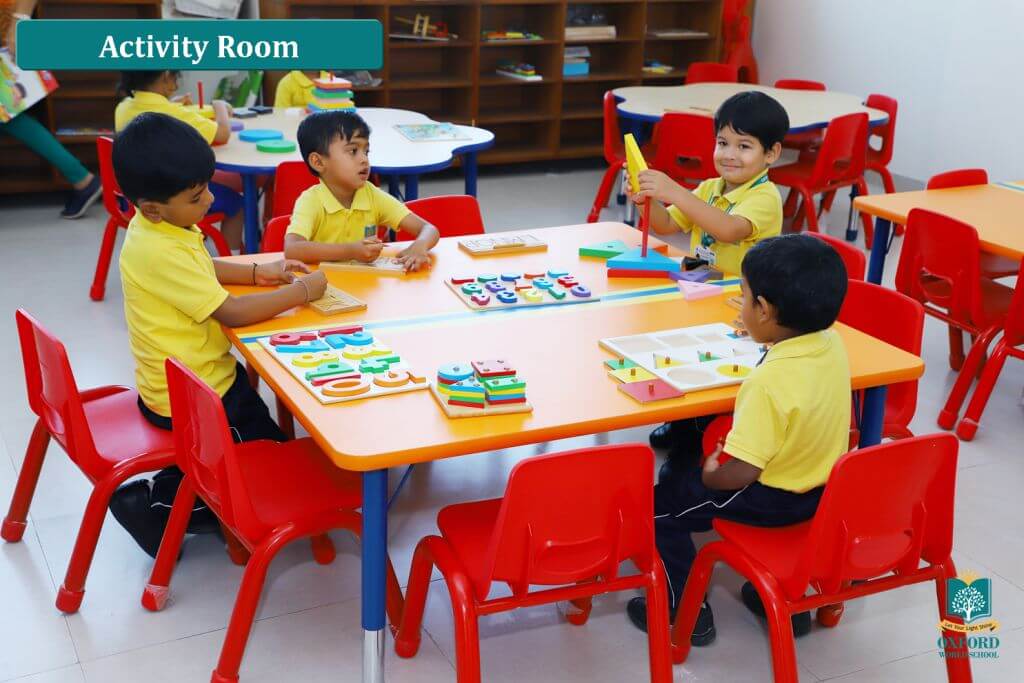 students doing activities at activity room of oxford world school kharadi pune